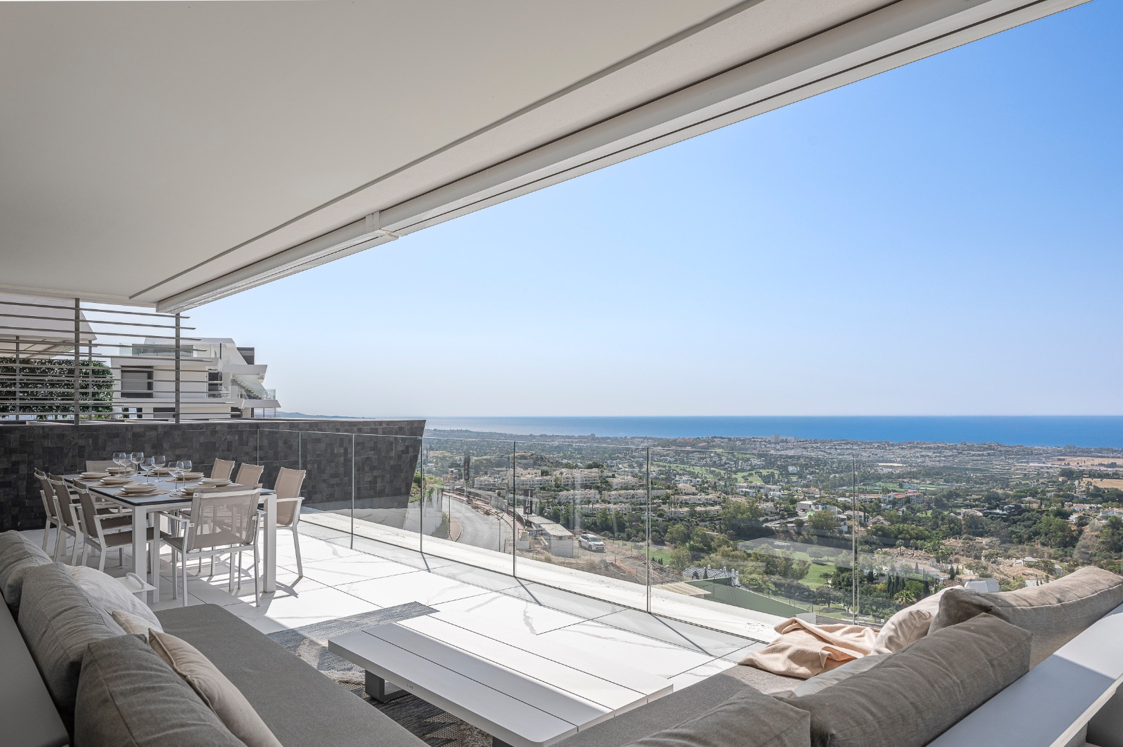 Modern South-Facing Apartment with Panoramic Views in La Heredia, Benahavis - Andalucia Realty