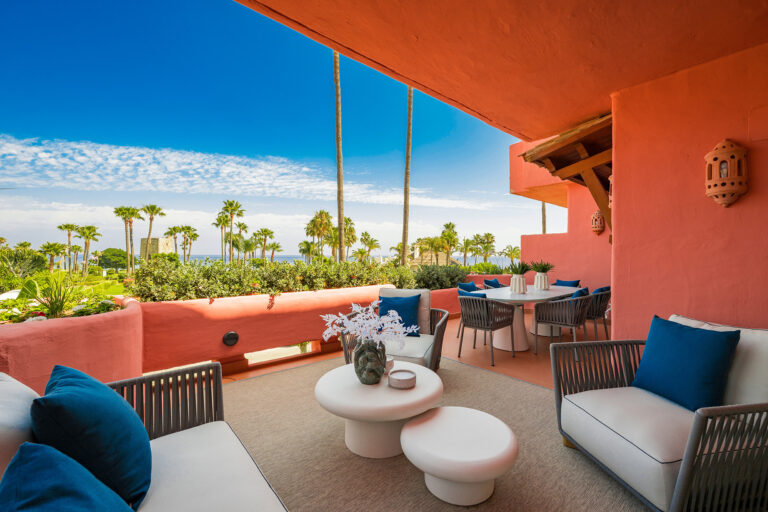 Refined beachfront apartment with sea views and generous terraces in Beach Side New Golden Mile, Estepona East.